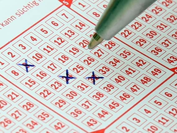 People in Mansfield try their luck at fifteen lotteries around the world.