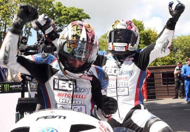 The Birchall brothers celebrate their win.