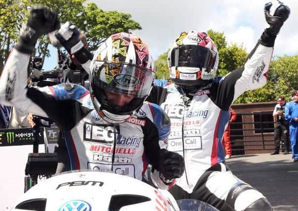 The Birchall brothers celebrate their win.