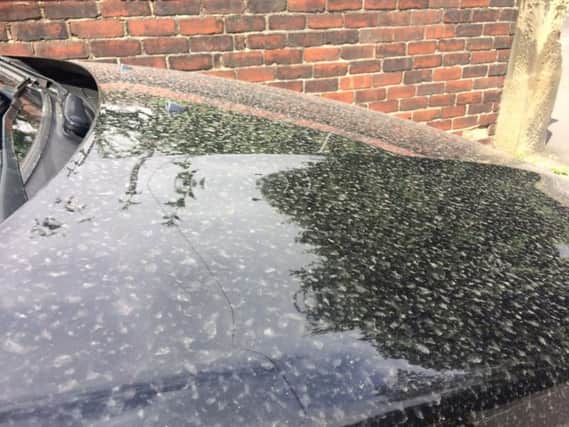 Cars across the UK have been left covered in a layer of red dust