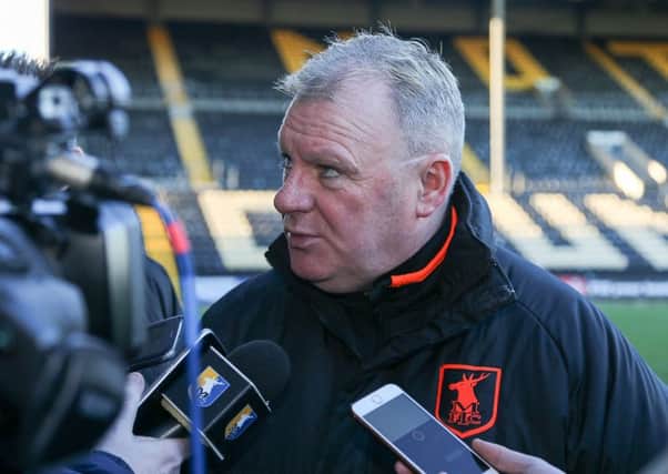 Mansfield Town's Manager Steve Evans speaks with the press - Pic by Chris Holloway