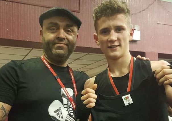 East Midlands champion Archie Alton with Julian Leivars