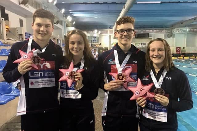 Delighted Lily Boseley (far right), of Ashfield, with her teammates after winning a bronze medal in the medley relay at the European Junior Swimming Championships in Israel.