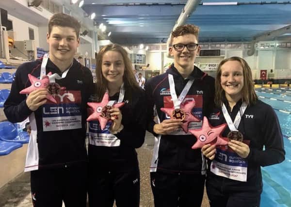 Delighted Lily Boseley (far right), of Ashfield, with her teammates after winning a bronze medal in the medley relay at the European Junior Swimming Championships in Israel.