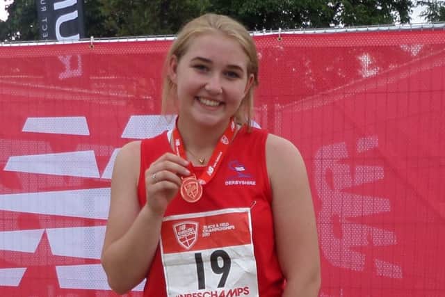 Kelsey Pearce, of Mansfield Harriers, with her medal from the English Schools Athletics Championships.