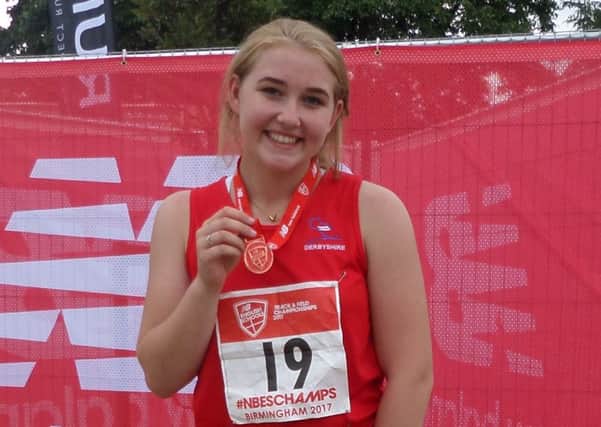 Kelsey Pearce, of Mansfield Harriers, with her medal from the English Schools Athletics Championships.