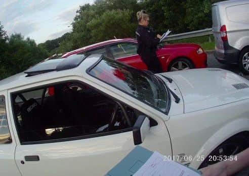 Police targeted a car cruising event on the M1 on Sunday.