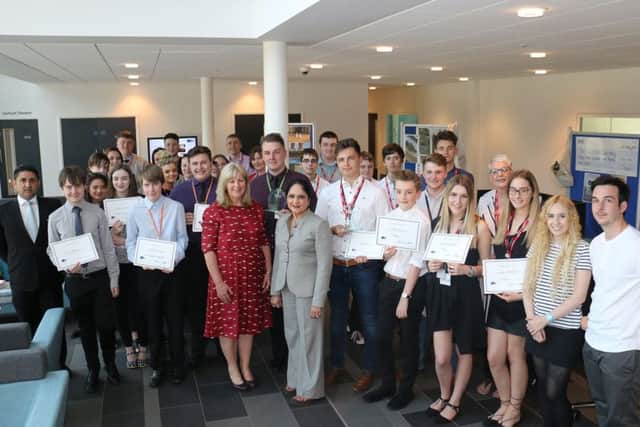 Members of the winning teams with judges at the Future Business Leader Challenge.