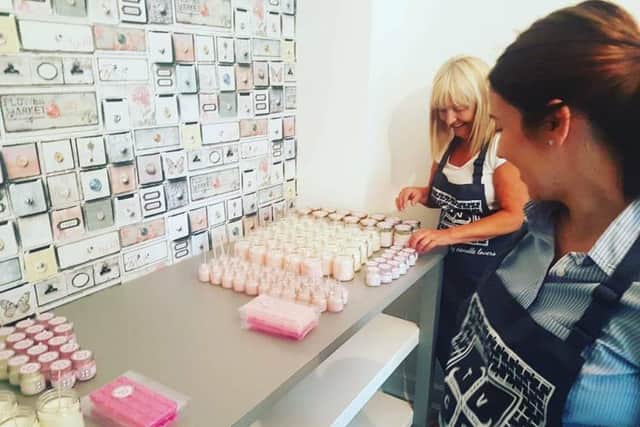 Mum Chantelle North putting the finishing touches to the fragrant candles.