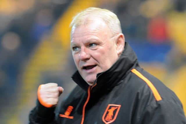 Steve Evans.
