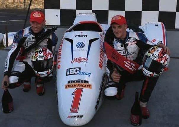 The Birchall brothers after their triumph in one of the Isle Of Man Southern 100 F2 Sidecar Class races.