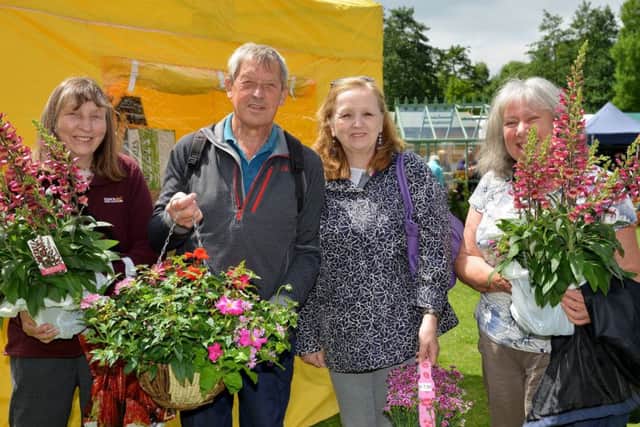 East Midlands Flower Show at Newstead Abbey, keen gardeners with their purchases from left Linda and Dave Epton, Diane Allsopp and Sheila Cupit
