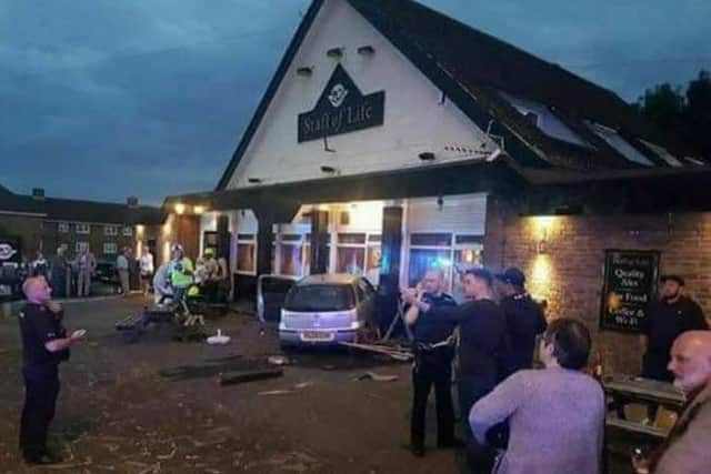 A car smashed intot he Staff of Life pub at Sutton on Sunday July 2.
