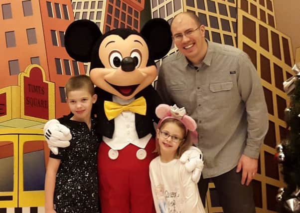 Dad Matt Wardle on a family holiday to Disneyland Paris with his two children, Harry and Rosie, in December 2015. Five months later, he was dead.