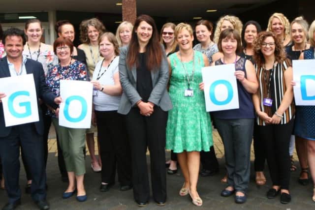 Principal Liz Barrett (centre), tutors, apprentices, students and staff at the trust celebrate their Ofsted rating.
