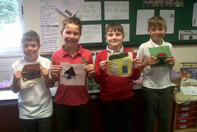 Pupils with their artwork, prior to it being sent off for the exhibition