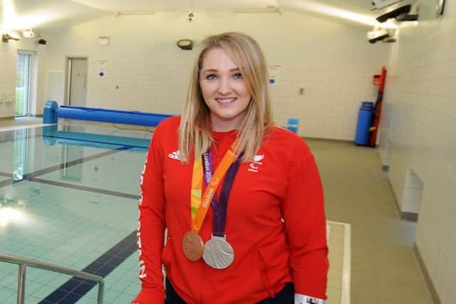 Charlotte Henshaw pictured with her Paralympic silver and bronze medals from London 2012 and Rio 2016 before making the switch to canoeing
