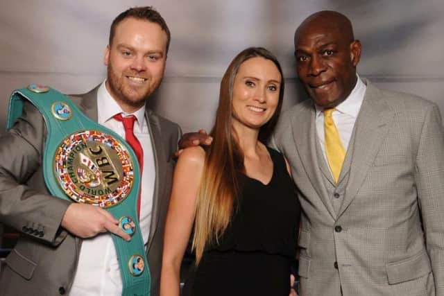Laura Hemmings with husband Jamie and boxing superstar Frank Bruno, who they brought to Mansfield.