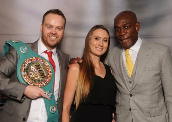 Laura Hemmings with husband Jamie and boxing superstar Frank Bruno, who they brought to Mansfield.