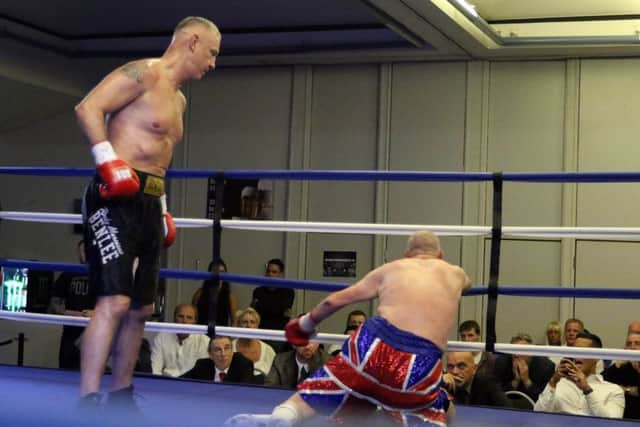 The end for Steve Ward as Andreas Siddon stands over him after flooring him with a straight left.