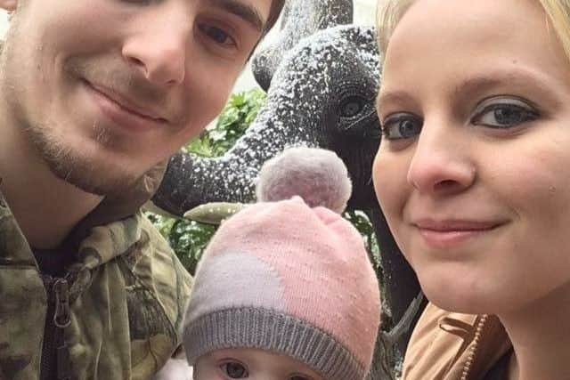 Tyler Savage, daughter Emma and Lizzy Hill.