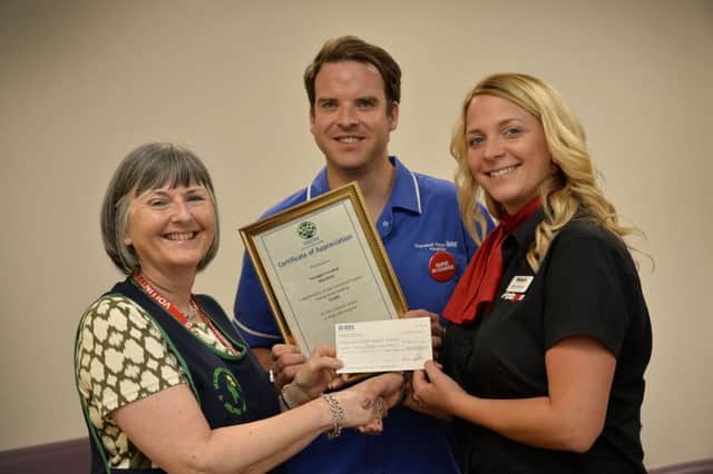 From left, Jill Smallwood, chairman of Kings Mill Hospital volunteers, Rob Gullitt-Smith, Deputy Ward leader for ward 25, Hollie Fensome from Pentagon
