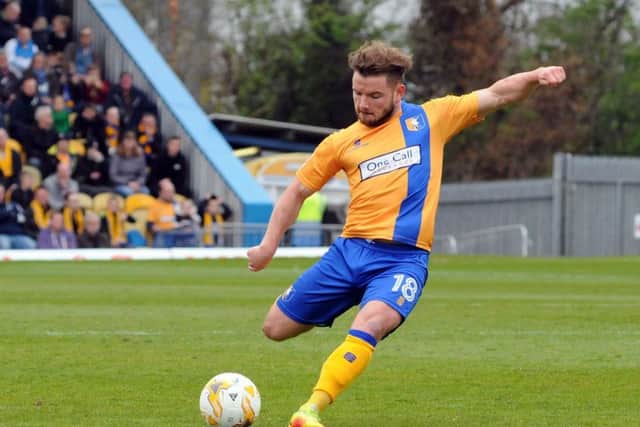 Mansfield Town v Portsmouth.
Alex MacDonald takes a first half shot at goal.