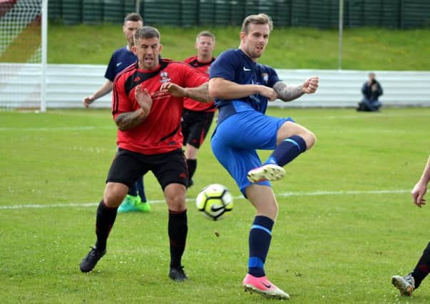 Action from the pre-season friendly between Shirebrook Town and Worksop Town.