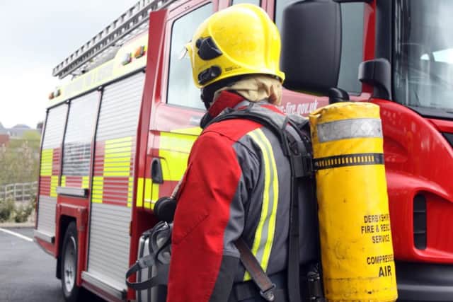 NDET 98608stock pic - generic chesterfield fire engine fire fighter photo fire brigade