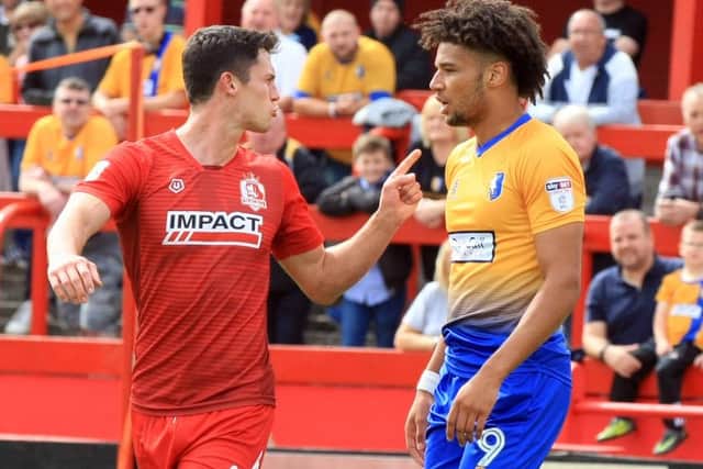 Pre-season friendly between Alfreton Town and Mansfield Town - Saturday July 29th 2017. Mansfield player Lee Angol and Alfreton player Billy Priestley. Picture: Chris Etchells
