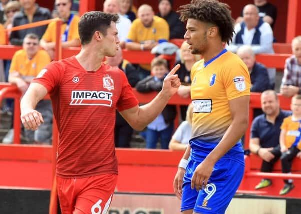 Pre-season friendly between Alfreton Town and Mansfield Town - Saturday July 29th 2017. Mansfield player Lee Angol and Alfreton player Billy Priestley. Picture: Chris Etchells
