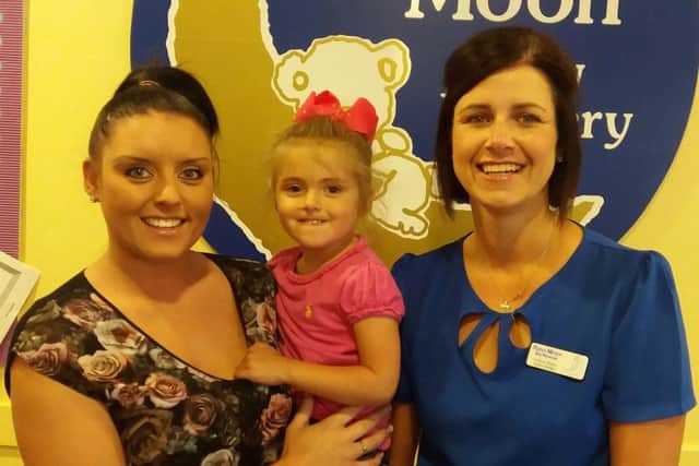 Mum Claire Smith, daughter Sophia and Andrea Baker, Nursery Manager on the right