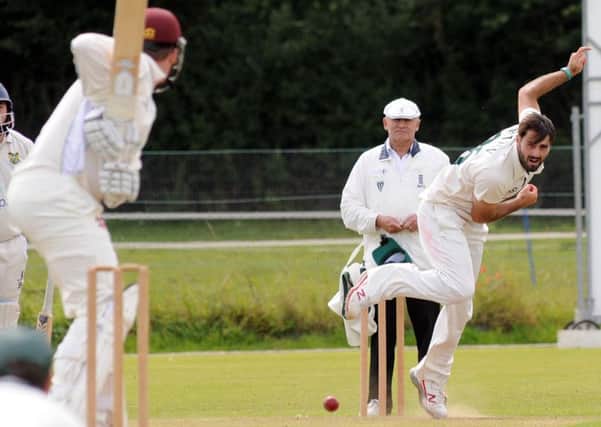Notts star Brett Hutton in bowling action for relegation-threatened Farnsfield at Hucknall in the Notts Premier League.
