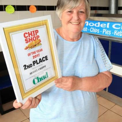 Second place went to Model Chippy in Shirebrook. Pictured is owner Julie Williams with her award.
