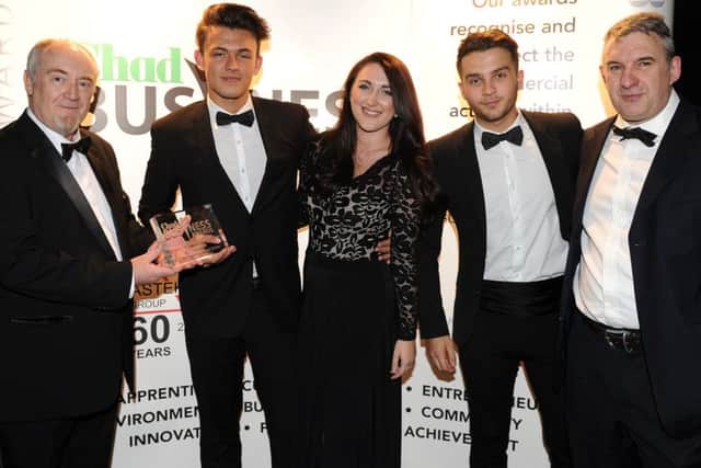 Mansfield Manor Hotel are presented with their winners award for the Hospitality, Leisure and Tourism Award from Andy Hibberd at the Chad Business Awards 2016. Picture: Andrew Roe.