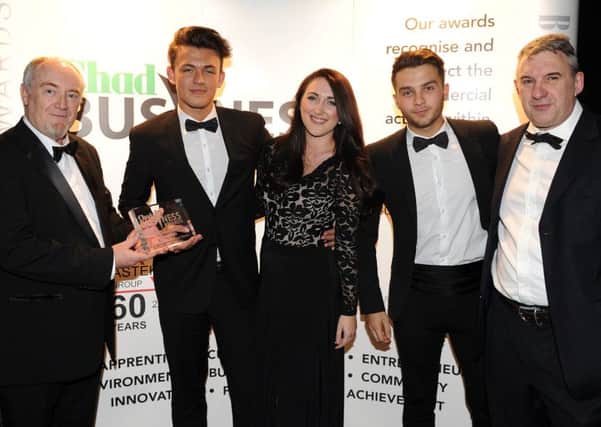 Mansfield Manor Hotel are presented with their winners award for the Hospitality, Leisure and Tourism Award from Andy Hibberd at the Chad Business Awards 2016. Picture: Andrew Roe.
