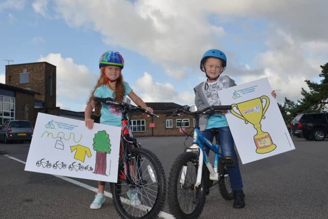 Winners of the Tour of Britain poster competition Saffron Keegan, six and Connor Chidlow, six