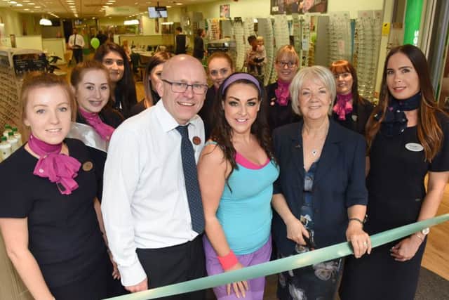The re-opening of the store, with Dame Mary Perkins, Hayley-Jo, store director Nigel Davidson and staff. (PHOTO BY: Rob Lacey)