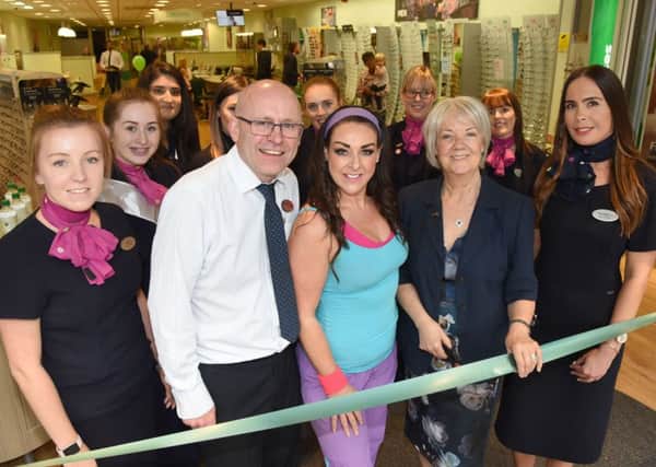 The re-opening of the store, with Dame Mary Perkins, Hayley-Jo, store director Nigel Davidson and staff. (PHOTO BY: Rob Lacey)