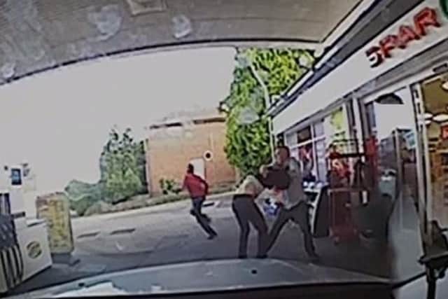 Karl Holden takes on the armed robbers at Castelle Service Station on Sherwood Street