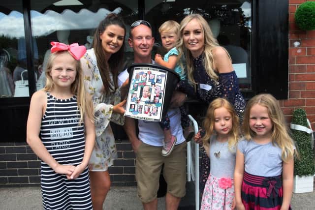 Fundraising organisers Kat Lichaj and Jenny Vallance were collecting cash and selling raffle tickets for Dawson.