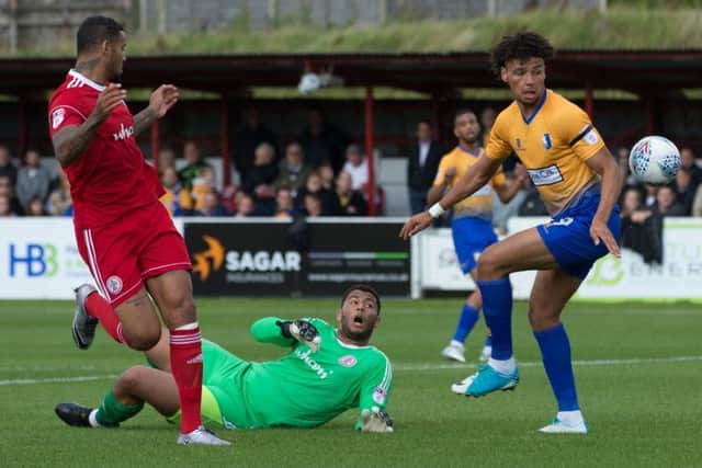 Accrington Stanley vs Mansfield - Lee Angol spins round to an empty net - Pic By James Williamson