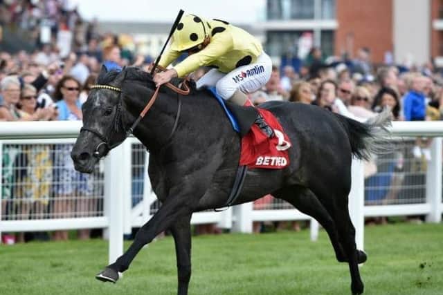 Defoe, ridden by Andrea Atzeni, storms to victory at Newbury on Saturday to set up a tilt at the William Hill St Leger at Doncaster next month.