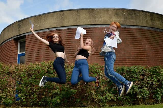 GCSE results day at All Saints Catholic Voluntary Academy, pictured are from left Tayler Harrison, Chelsea Gilliatt and Joshua Chant