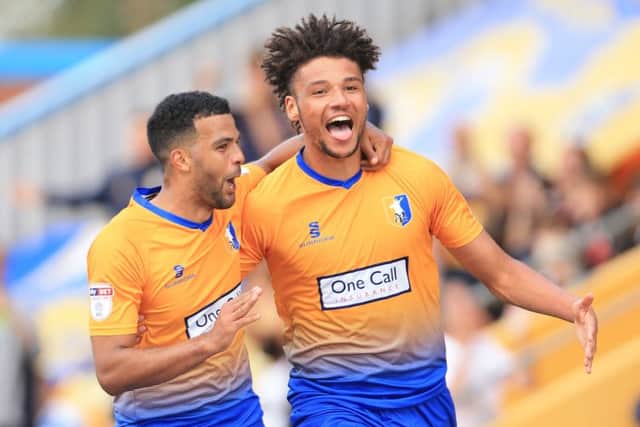 Lee Angol of Mansfield Town celebrates scoring his goal with Jacob Mellis of Mansfield Town  during the Sky Bet League 2 match between Mansfield Town and Luton Town at the One Call Stadium, Mansfield, England on 26 August 2017. Photo by Leila Coker.