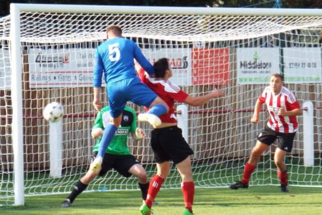 A headed chance for Jason Gregory during Teversals 3-2 defeat at Anstey Nomads on Saturday. (PHOTO BY; Keith Parnill)