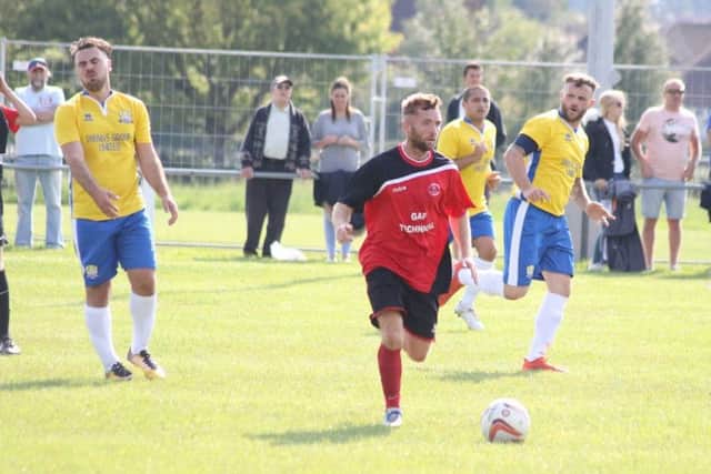 Ollerton Towns Sean Dickinson on the ball during the 1-1 draw with local-derby rivals, FC Bolsover. (PHOTO BY: DC Photography, Retford)