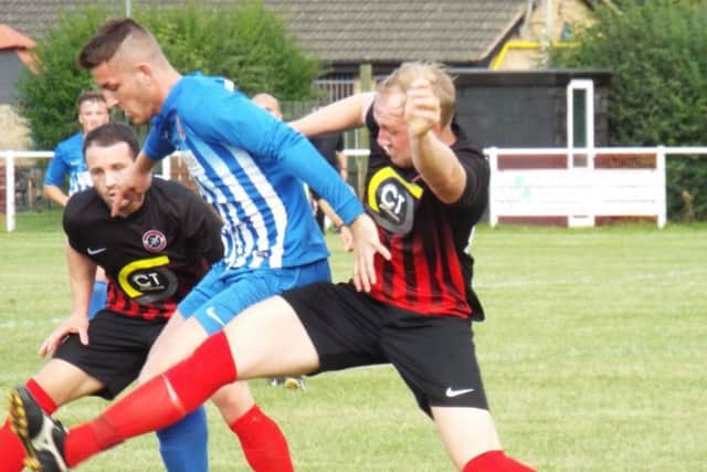 Action from Teversal's 1-1 draw at Barrow Town (PHOTO BY: Keith Parnill)