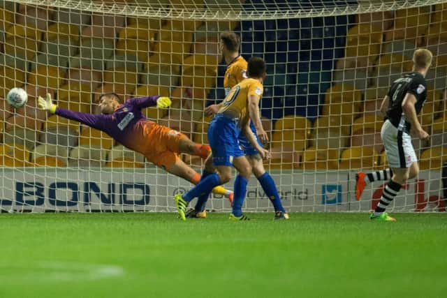 Mansfield vs Lincoln - Elliott Whitehouse of Lincoln City levels the scores - Pic By James Williamson