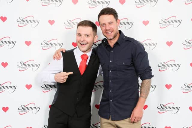 AFTER -- Jordan Martinez (left) is congratulated by former England footballer Wayne Bridge after his weight loss with Slimming World.